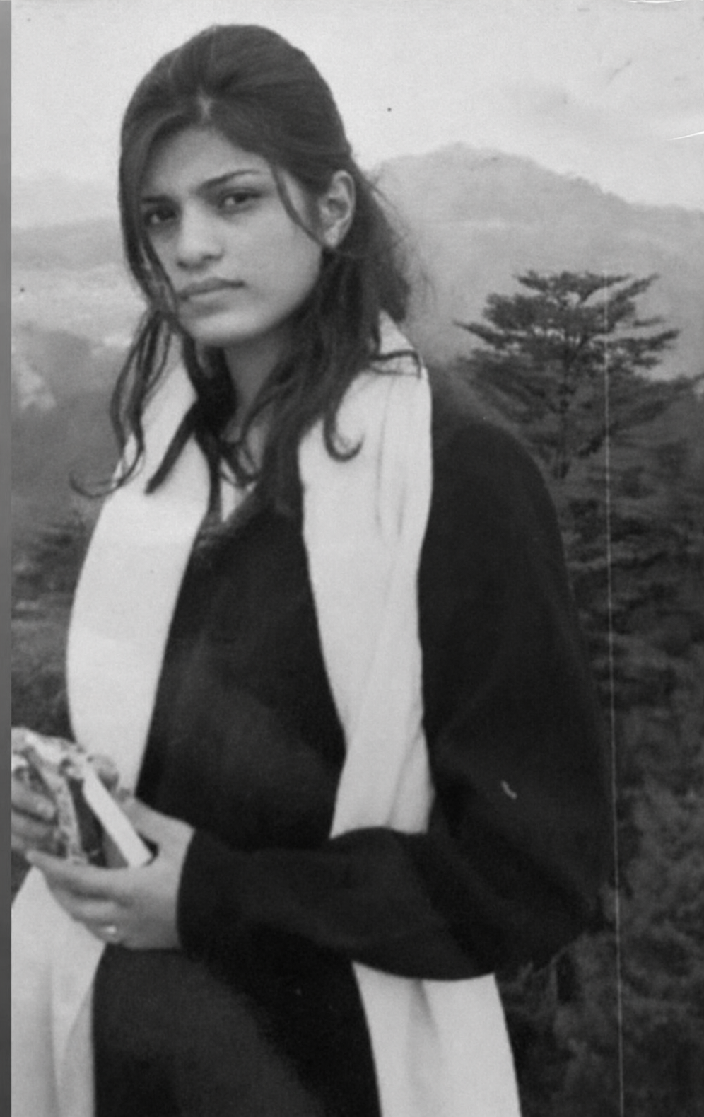 Black-and-white portrait of a young Abhilasha Lonari outdoors